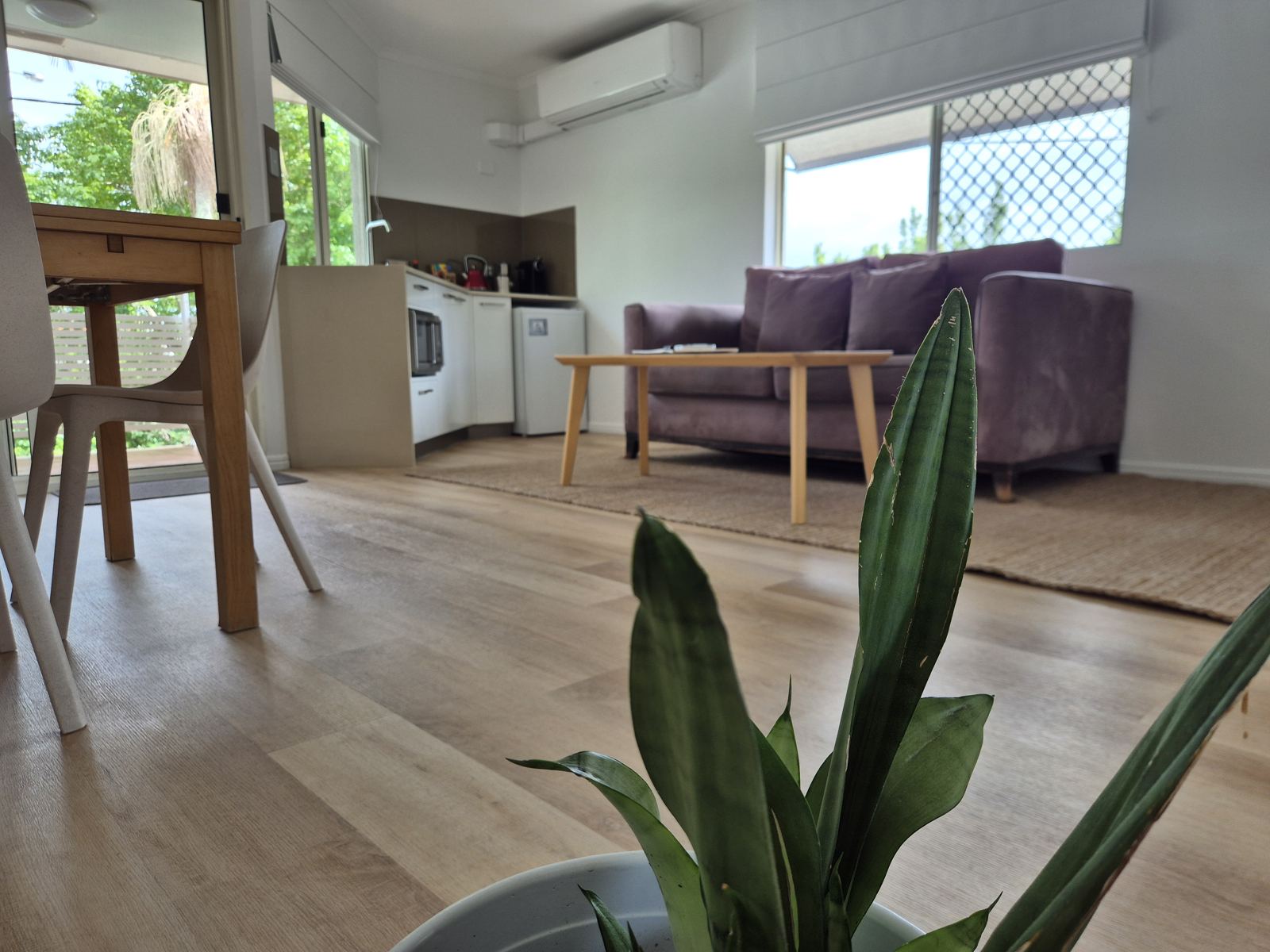 Lounge and kitchenette with timber floors